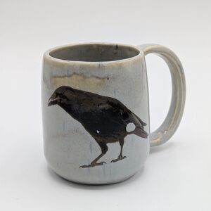 Hand Crafted Light Gray Ceramic Mug with Black Raven Motif